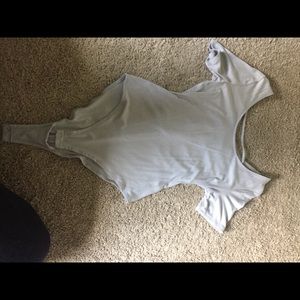 light blue/gray body suit